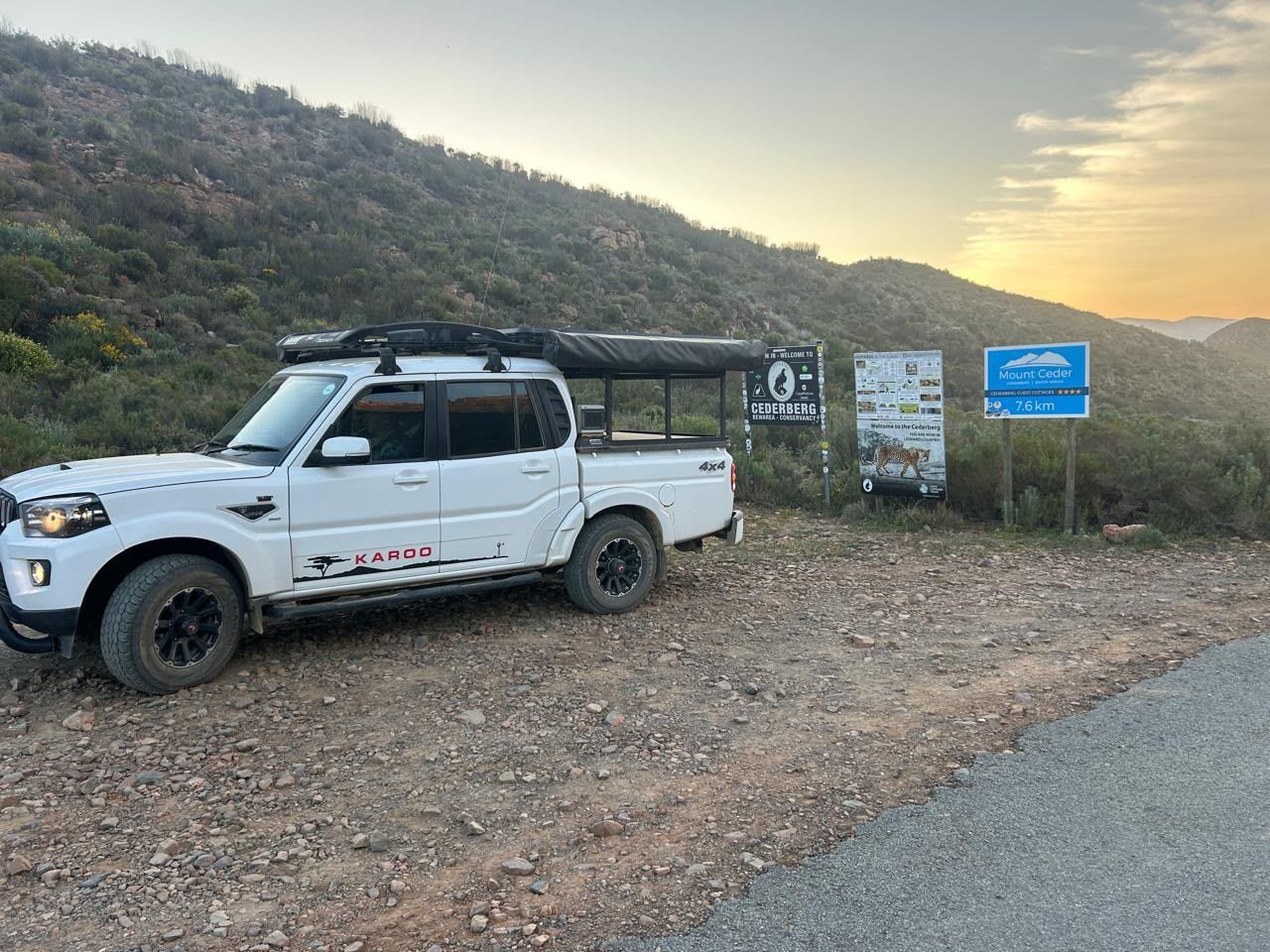 Mahindra Karoo at the Cederberg conservancy sign at sunset