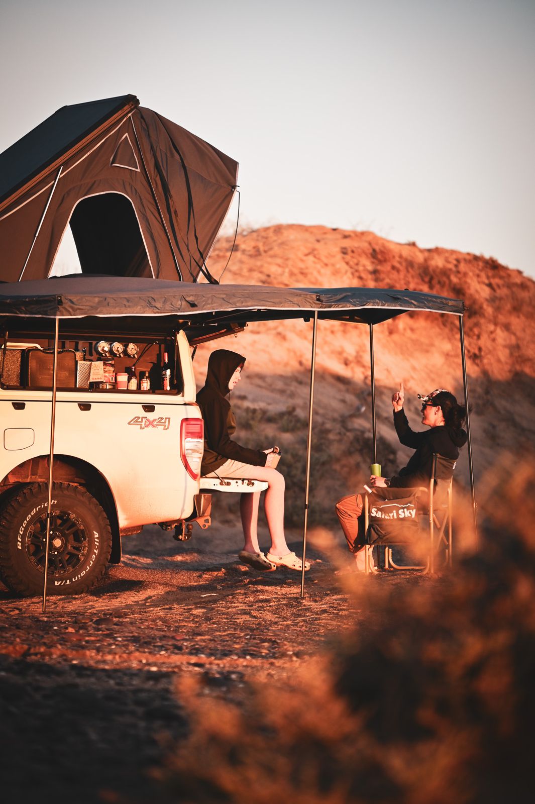 Evening chat under the awning while camping in Namibia